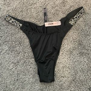 Black Victoria’s Secret satin panties with sparkly straps